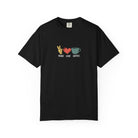 A black heavyweight cotton t-shirt featuring a retro peace sign, heart, and coffee cup graphic.