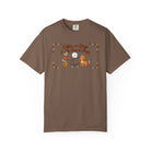 Brown t-shirt featuring a stick figure with a coffee mug and a dog with the text Coffee and Dogs.