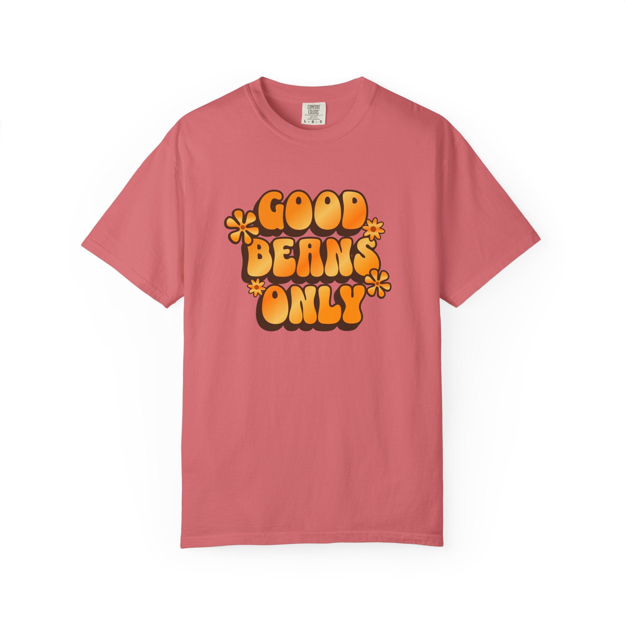A dusty rose short-sleeved t-shirt featuring the text Good Beans Only in a retro orange font.