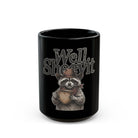 Black ceramic coffee mug featuring a raccoon wearing a cowboy hat and bandana holding a mug.