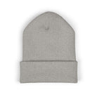 A grey cuffed beanie made of acrylic fabric.