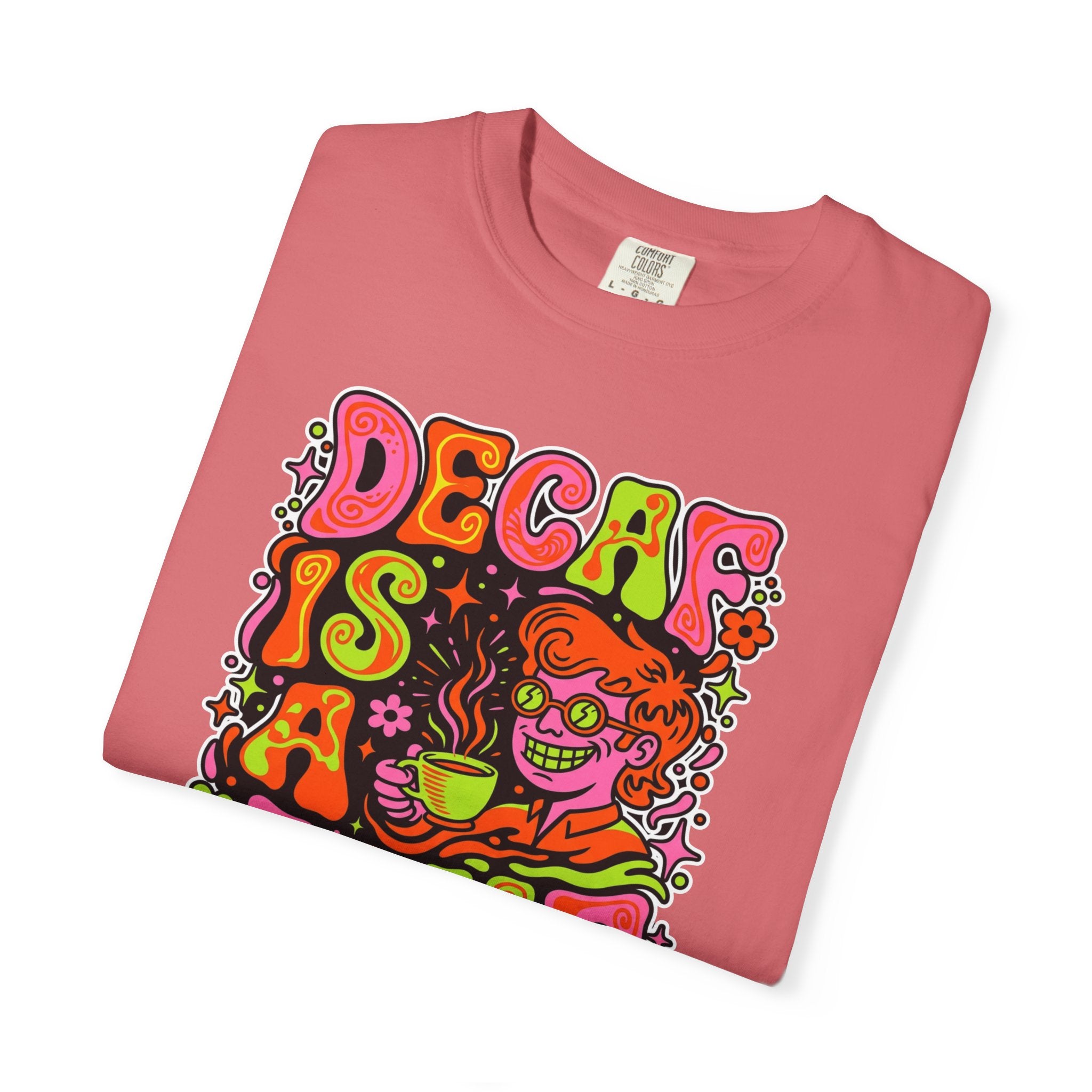 A pink t-shirt featuring a retro, psychedelic graphic of a person drinking coffee.