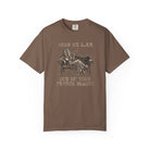 Brown Comfort Colors 1717 t-shirt with a coffee bean character lounging on a sofa graphic.