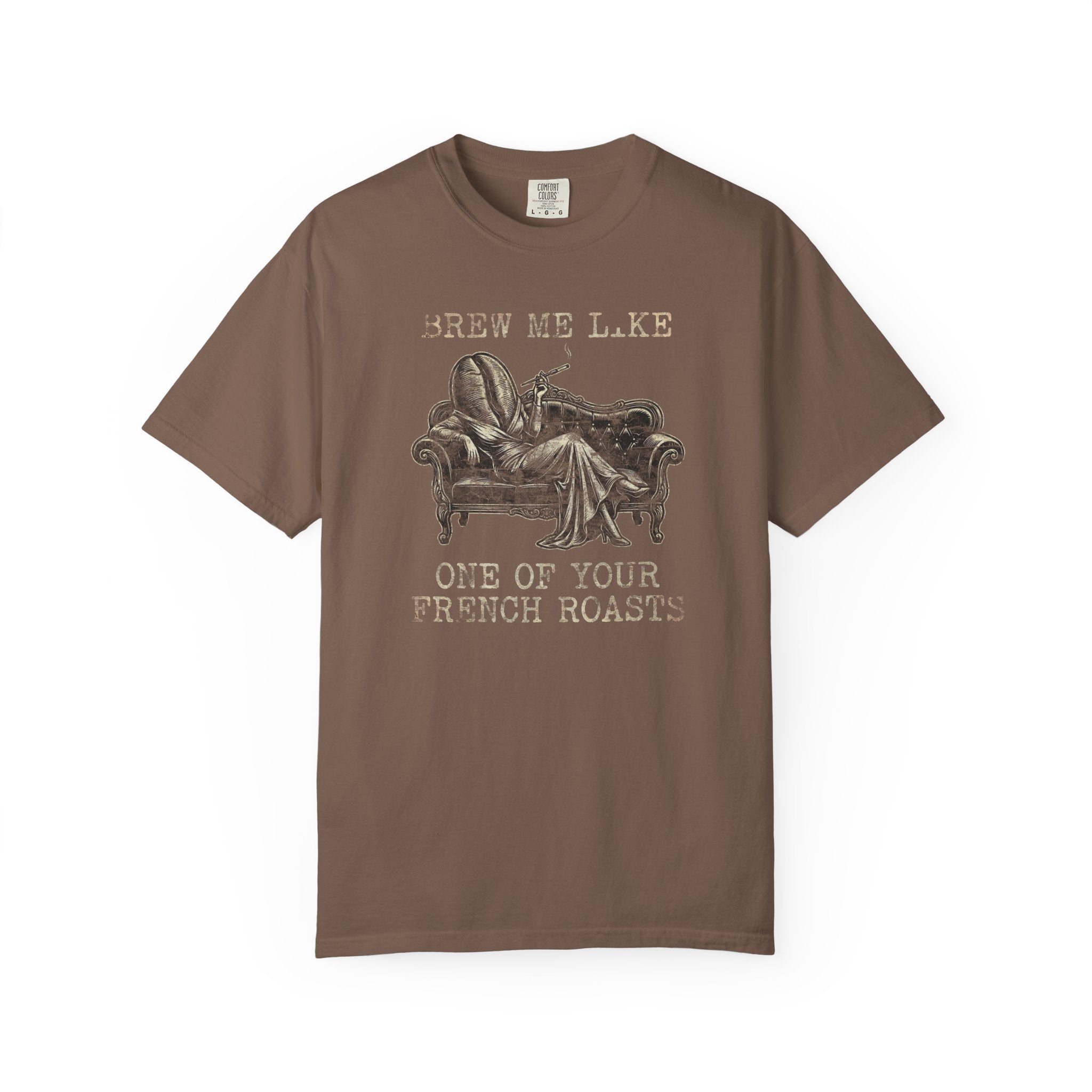 Brown Comfort Colors 1717 t-shirt with a coffee bean character lounging on a sofa graphic.