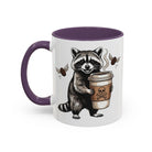 White ceramic mug with a purple handle and interior, featuring a raccoon holding a coffee cup.