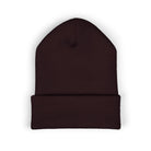 A dark brown cuffed knit beanie with a small embroidered coffee cup.