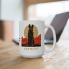 White ceramic mug featuring a German Shepherd illustration and the word LOYALTY on a wooden desk.