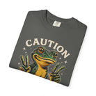 Dark grey t-shirt featuring a graphic of a smiling frog making peace signs with both hands.