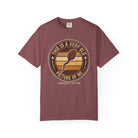 Maroon t-shirt with a vintage-style graphic of a coffee bean shaped like a sperm cell.