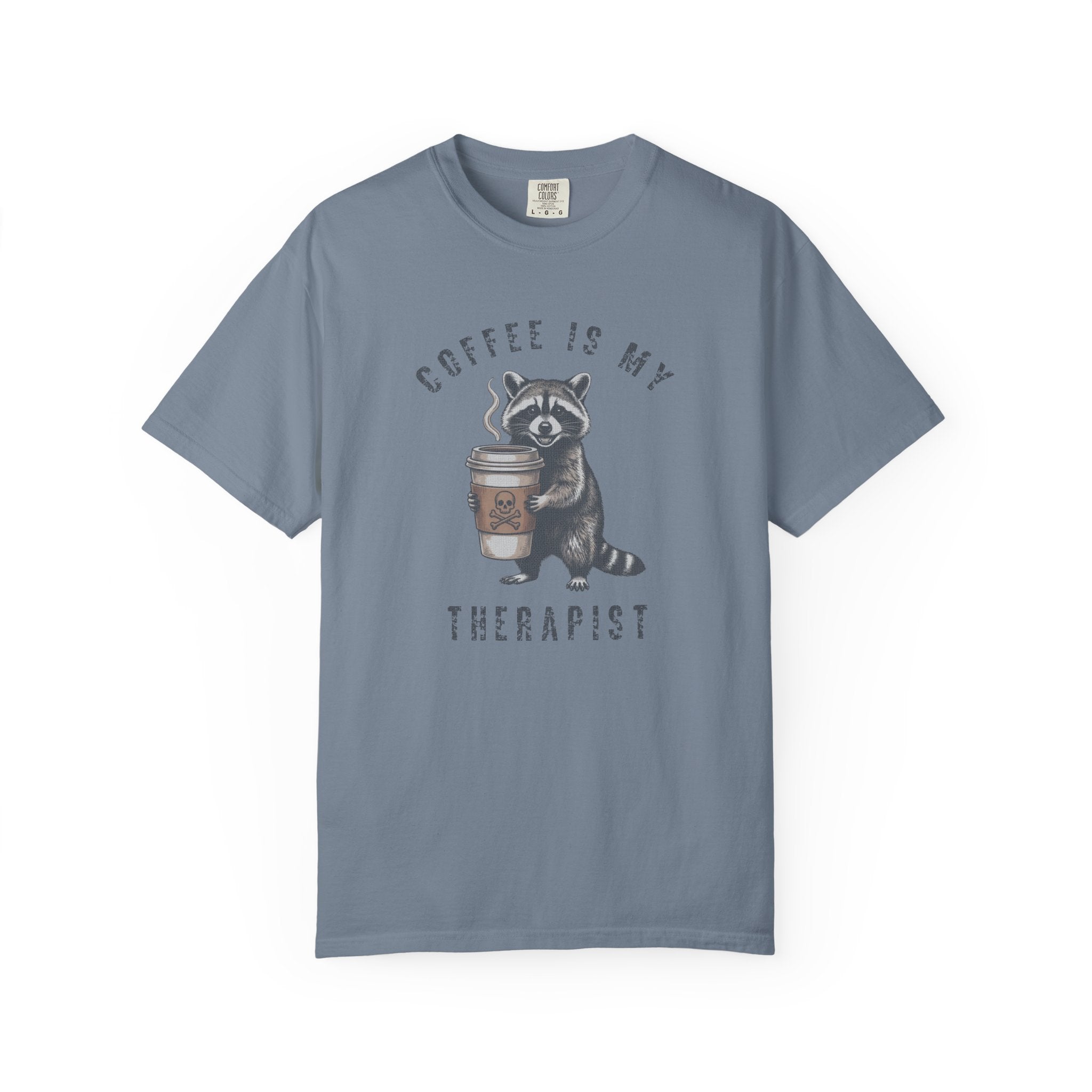 Blue unisex cotton t-shirt featuring a raccoon holding a coffee cup with a skull and crossbones.