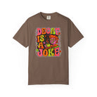 Brown t-shirt with a retro, psychedelic graphic reading 'DECAF IS A JOKE' with a coffee drinker.