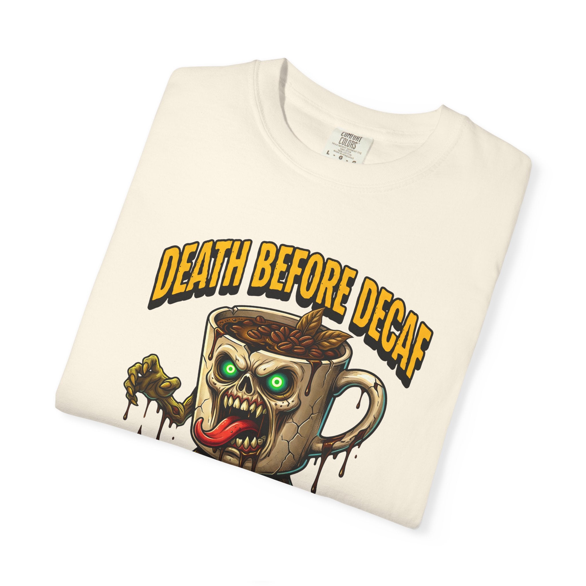 Off-white t-shirt featuring a gothic zombie coffee mug graphic with the text Death Before Decaf.