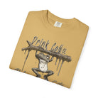 Mustard yellow unisex t-shirt featuring a graphic of a frog hanging from a branch with coffee text.