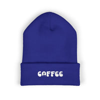 A blue knit beanie with "COFFEE" embroidered on the cuff.