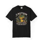 Black t-shirt with a graphic of a frog making peace signs and the text Caution Without Coffee.