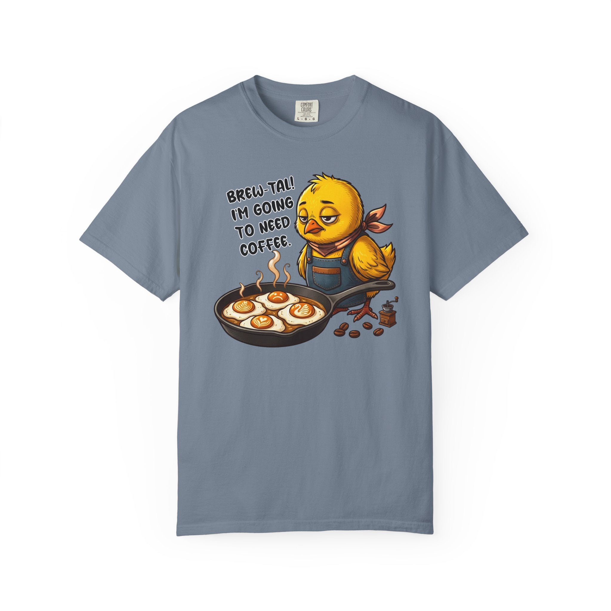 Blue-grey t-shirt featuring a sleepy chick in an apron with the text Brew-tal! I'm going to need.