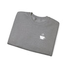 A gray crewneck sweatshirt featuring a small white steaming coffee cup icon on the chest.