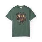 Green t-shirt featuring a graphic of a cowboy rooster pouring coffee with the text Rise & Shine.