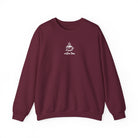 A maroon crewneck sweatshirt featuring a small white graphic of a smiling coffee cup and the text coffee time.