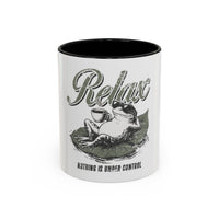 Ceramic accent mug with a graphic of a frog wearing sunglasses on a lily pad with coffee.