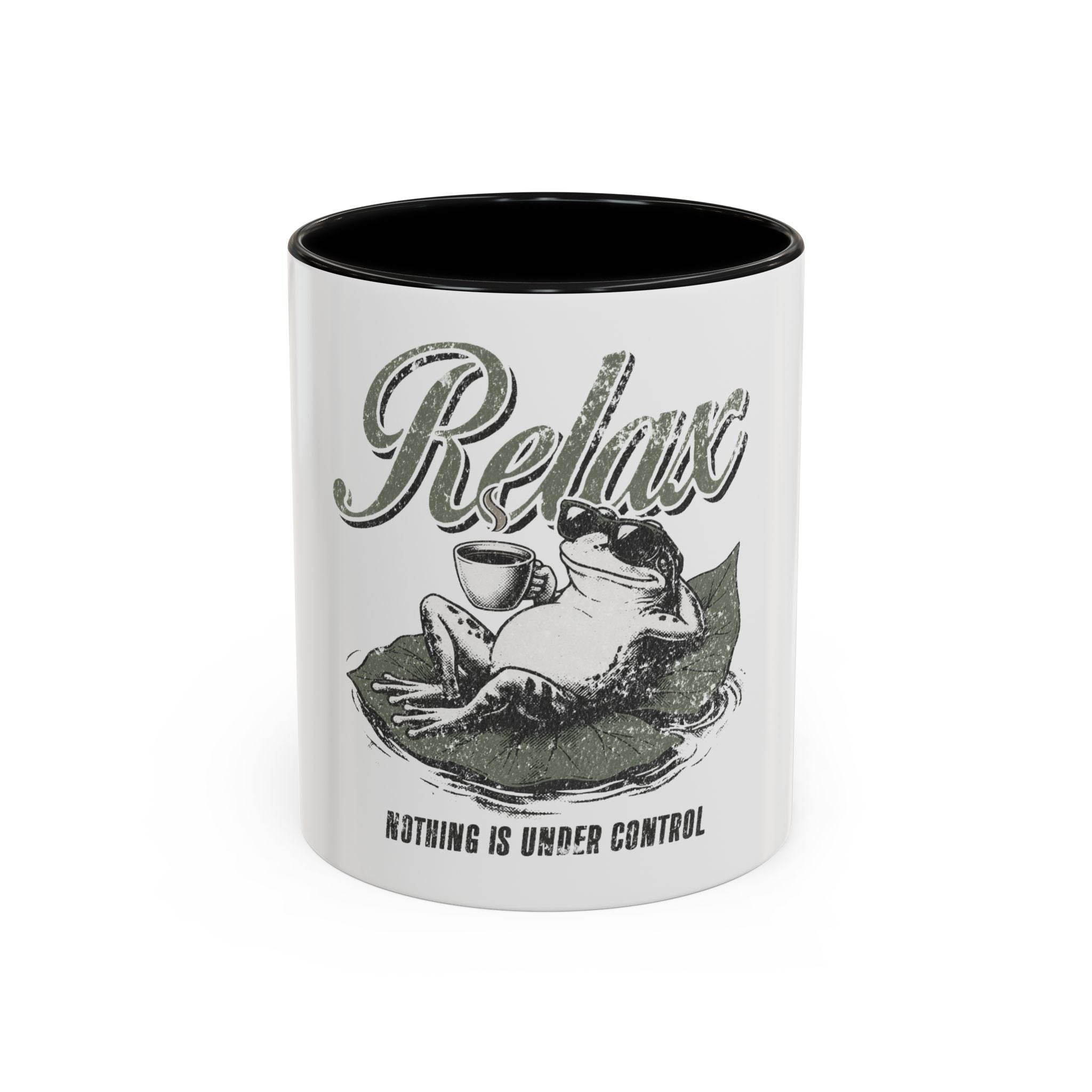 Ceramic accent mug with a graphic of a frog wearing sunglasses on a lily pad with coffee.