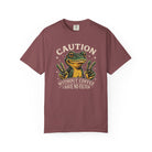 Maroon t-shirt featuring a graphic of a frog making peace signs with the text Caution No Filter.