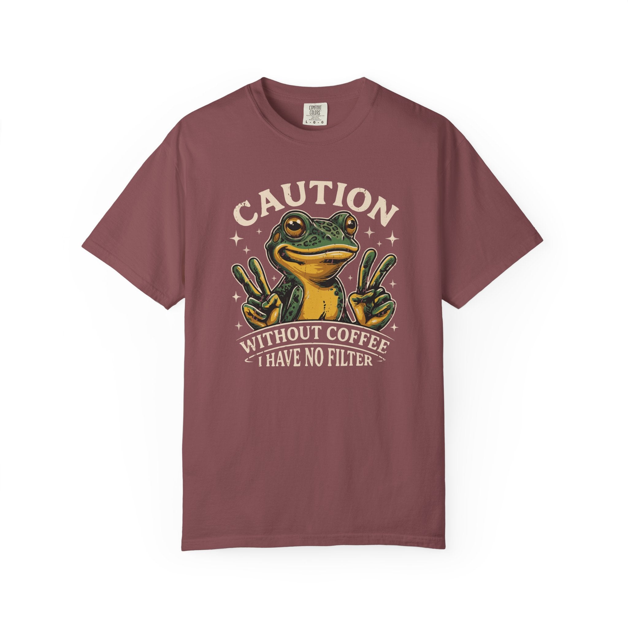 Maroon t-shirt featuring a graphic of a frog making peace signs with the text Caution No Filter.
