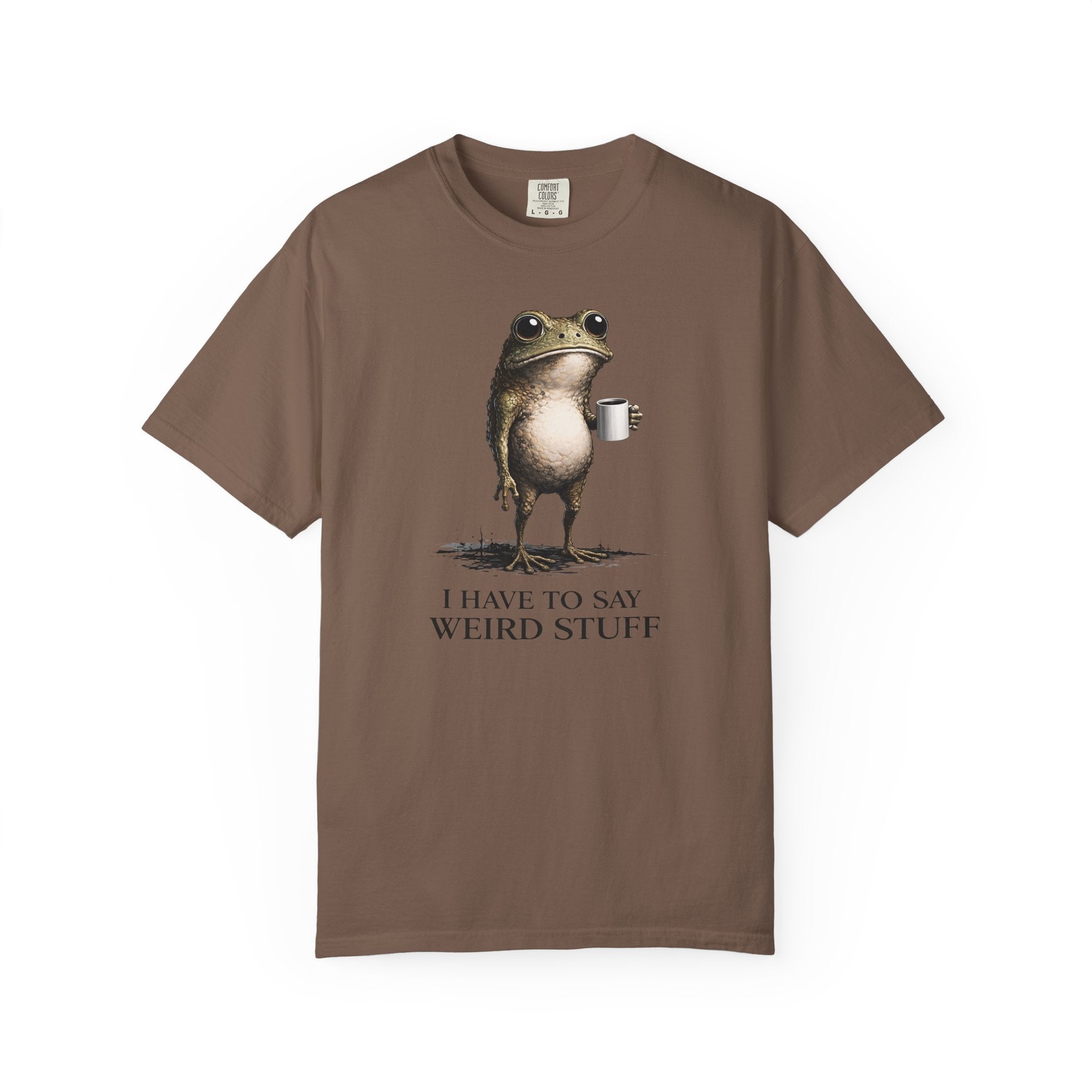 A brown cotton t-shirt featuring a graphic of a frog holding a coffee mug with the text I have to say weird stuff.