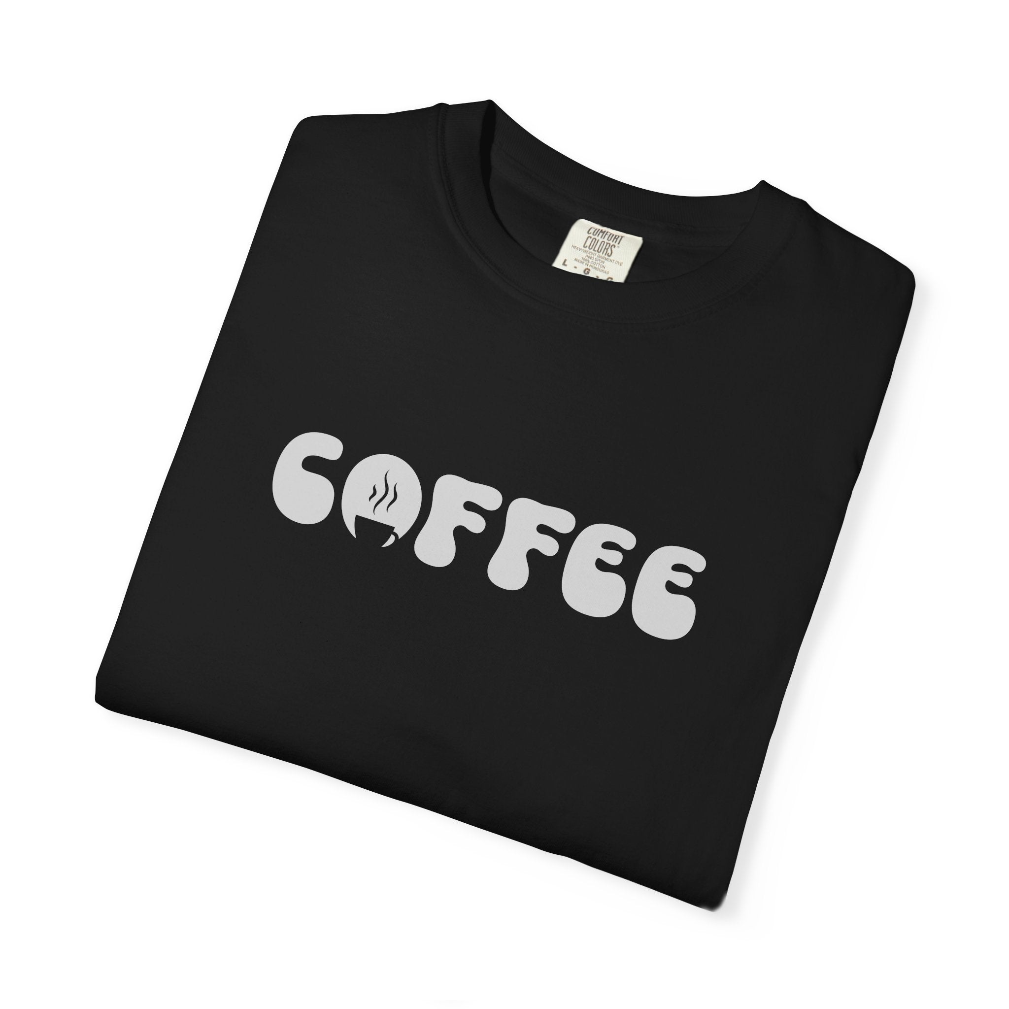 A black short-sleeved t-shirt featuring the word COFFEE in a white retro bubble font.