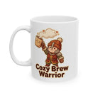 A white ceramic mug featuring a cartoon warrior holding a steaming mug with the text Cozy Brew Warrior.