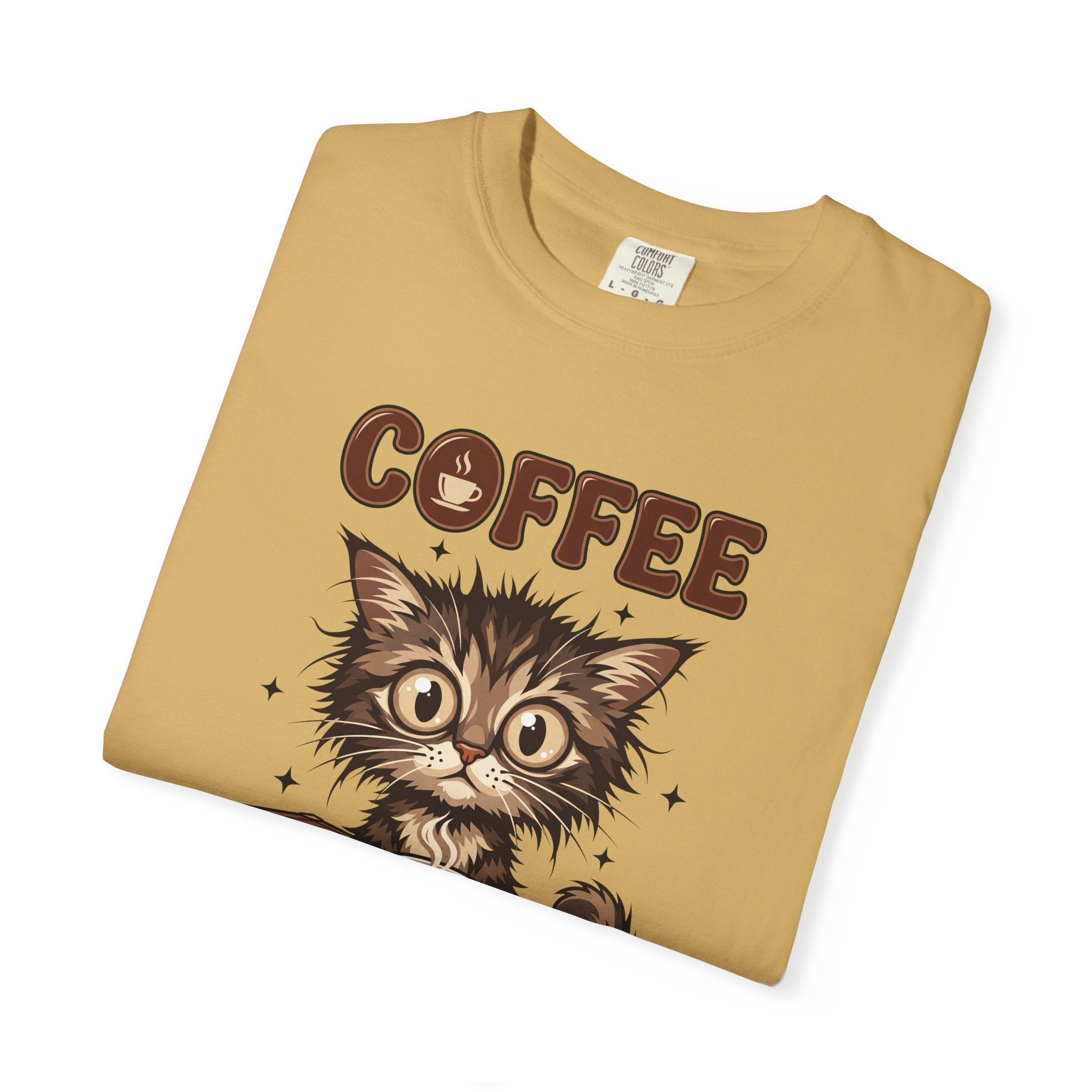 Tan unisex cotton t-shirt featuring a graphic of a wide-eyed kitten and the word COFFEE.