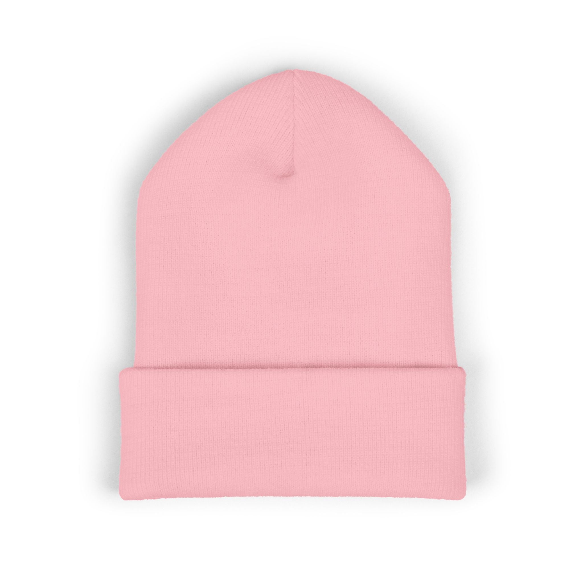 A pink cuffed knit beanie hat.