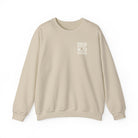 A beige crewneck sweatshirt featuring the text Drip With Sarcasm on the left chest.