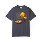 Dark grey t-shirt featuring a sleepy chick in an apron with a frying pan of coffee-art eggs.
