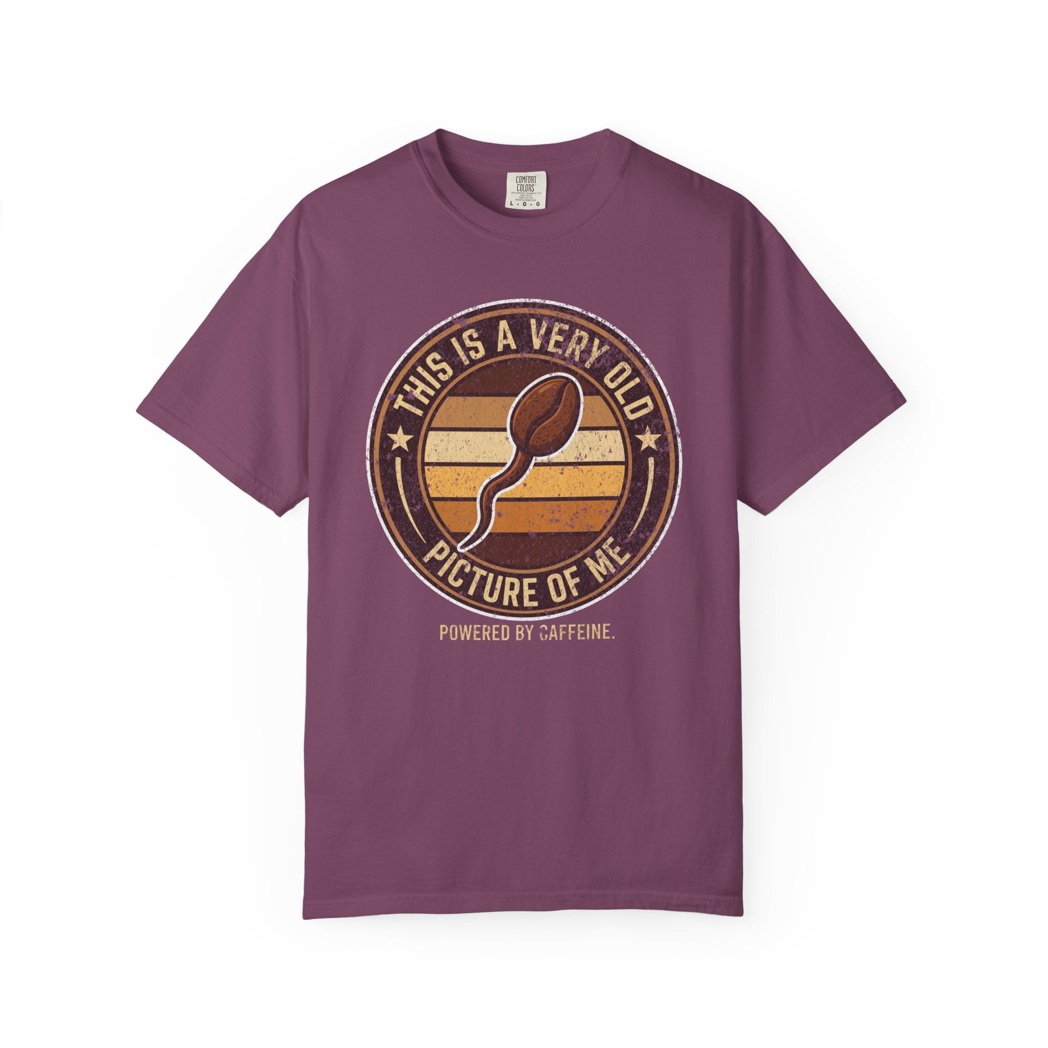 Purple t-shirt with a vintage-style graphic of a coffee bean shaped like a sperm cell.