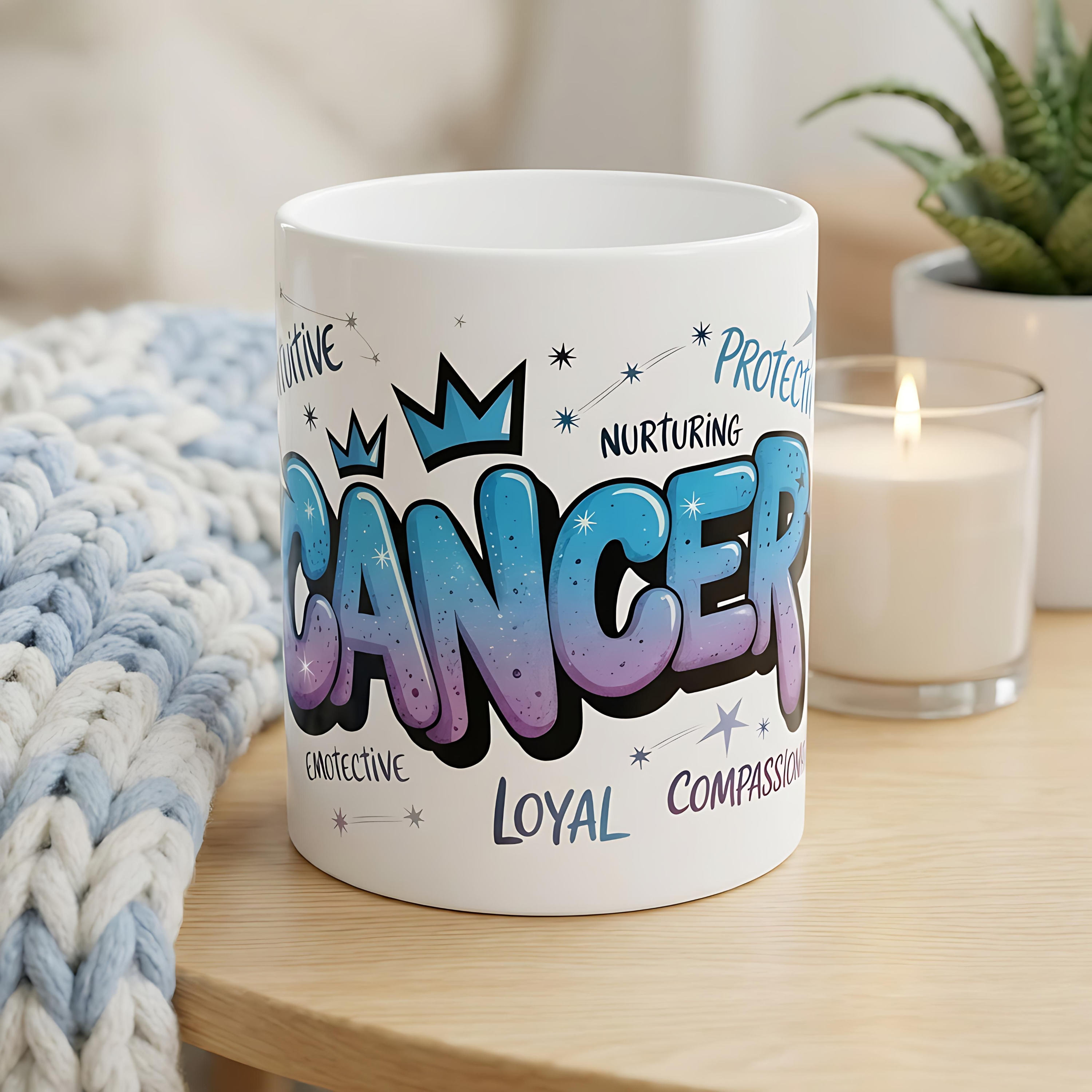 White ceramic mug featuring a colorful Cancer zodiac design with personality traits on a wooden table.