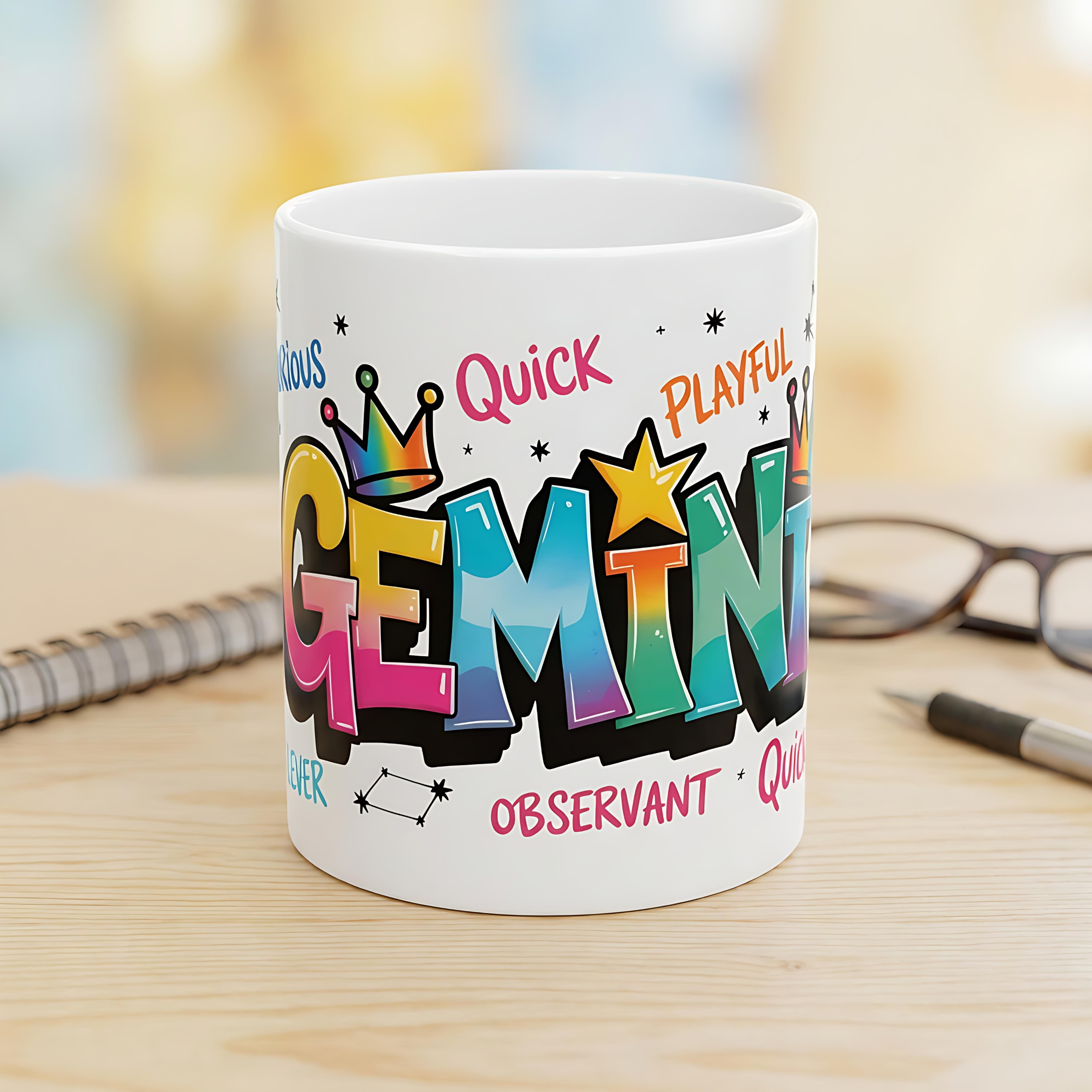 White ceramic Gemini zodiac mug with colorful graffiti-style lettering and personality traits.