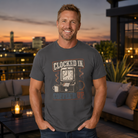 Man wearing a grey Comfort Colors 1717 t-shirt with a vintage clock and coffee graphic.
