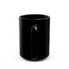 A black ceramic mug with a handle, shown from the side against a white background.