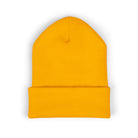A bright yellow cuffed knit beanie hat.