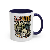 White ceramic mug with a blue handle and a retro skull graphic reading Death Before Decaf.