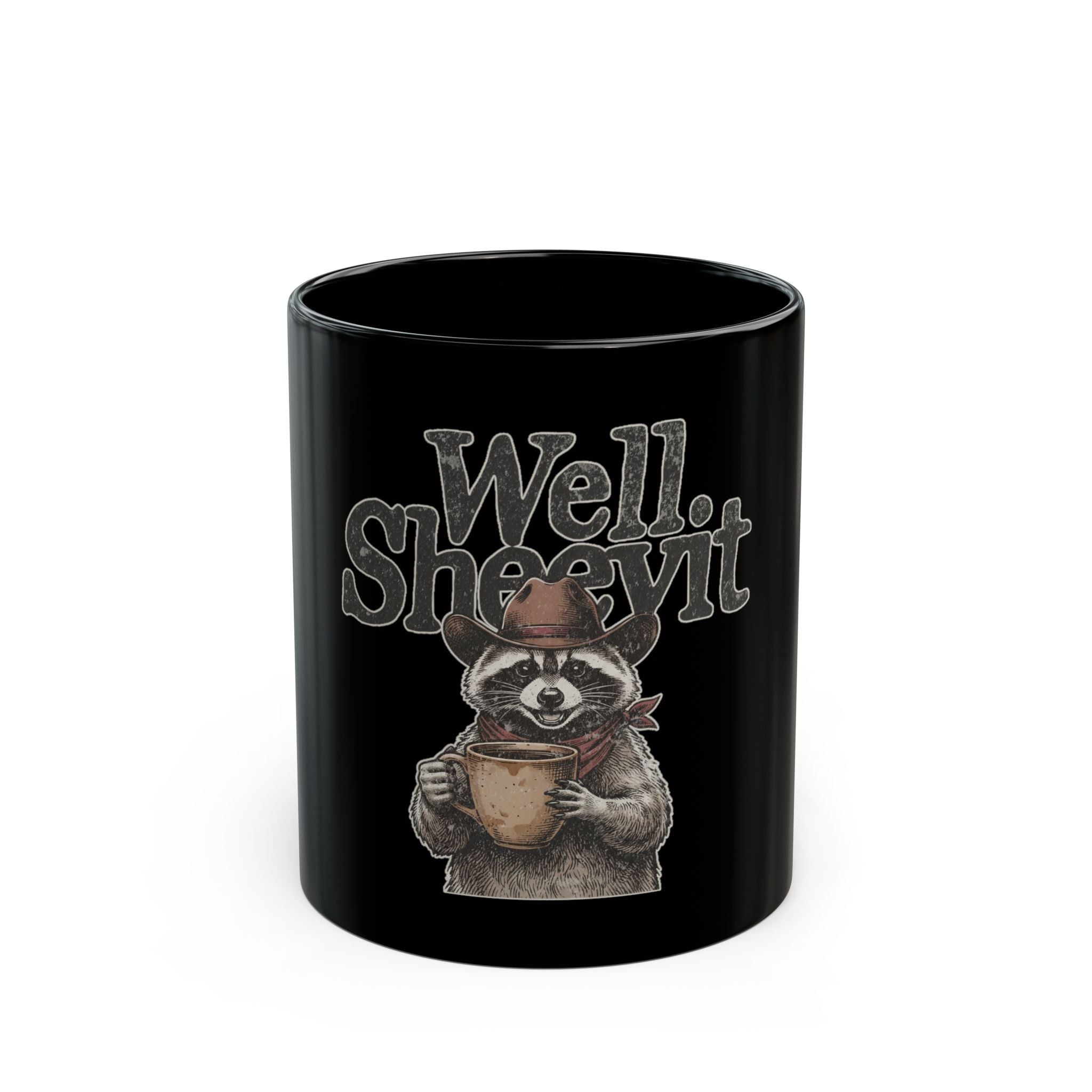 Black ceramic mug featuring a raccoon in a cowboy hat and bandana holding a coffee cup.