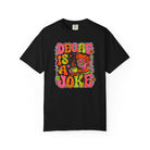 Black t-shirt with a retro, psychedelic graphic reading Decaf Is A Joke with a coffee-drinking man.