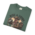 Green vintage wash cotton t-shirt featuring a graphic of a cowboy rooster pouring coffee.