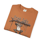 Orange unisex cotton t-shirt featuring a graphic of a frog hanging from a branch with text.