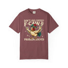 A maroon crewneck t-shirt featuring a graphic of a rooster wearing sunglasses and a cap.