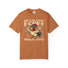 Rust-colored crewneck t-shirt featuring a graphic of a rooster wearing sunglasses and a cap.