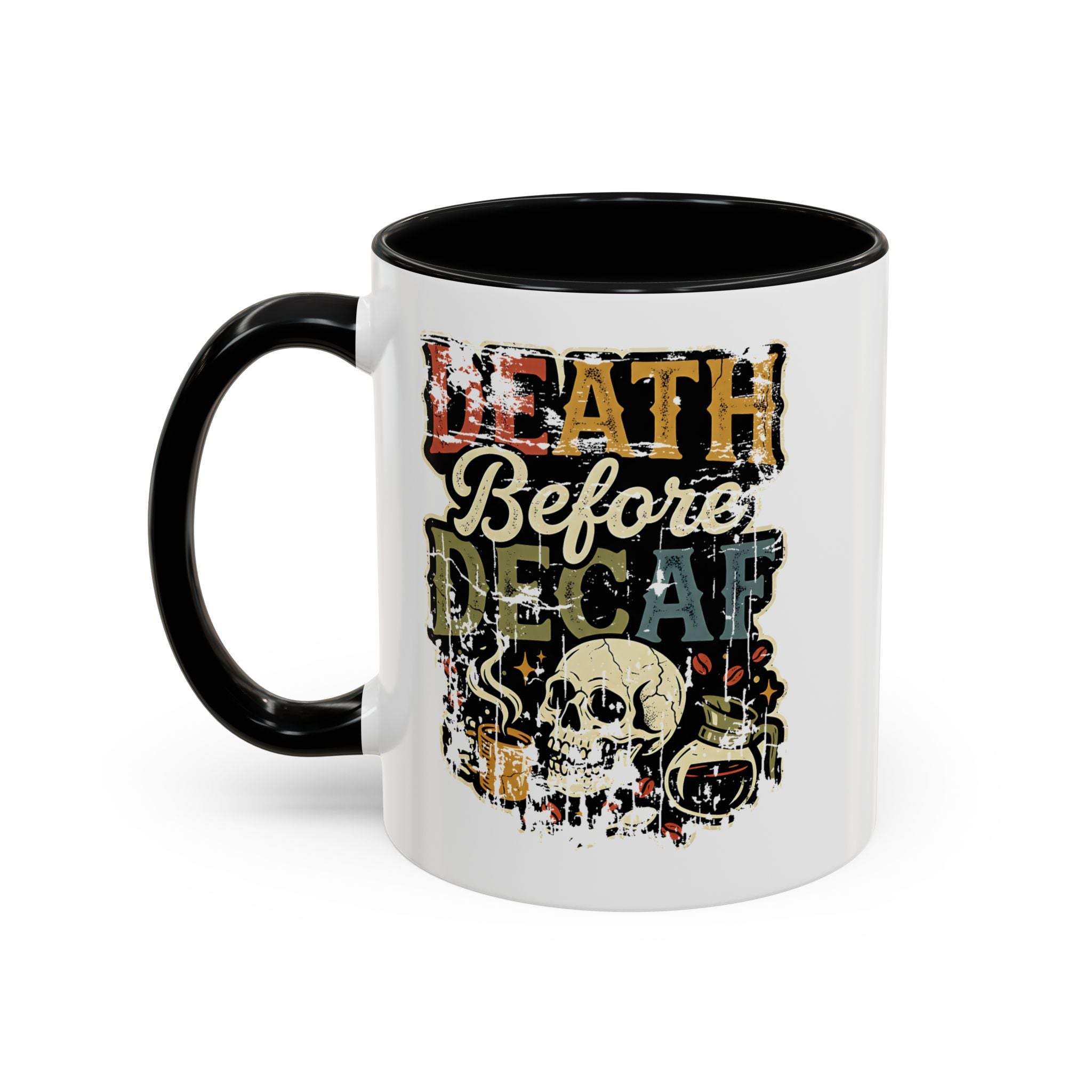 White ceramic coffee mug with a black handle and a retro Death Before Decaf skull graphic.
