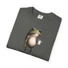 A charcoal grey t-shirt featuring a graphic of a frog holding a coffee mug.