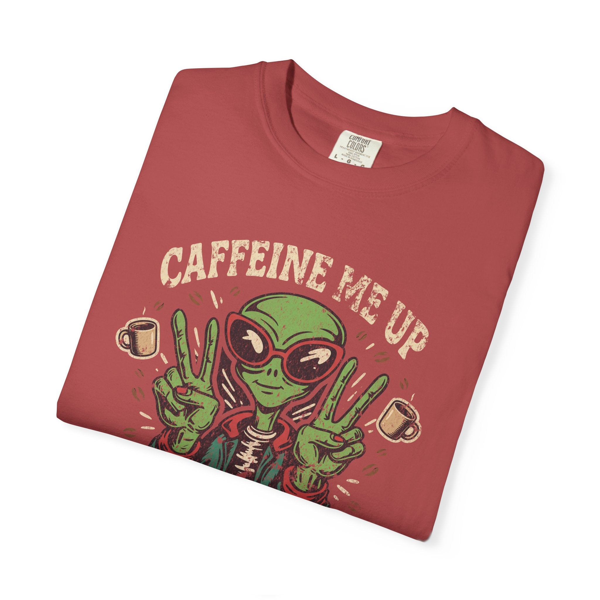 Red unisex cotton t-shirt featuring a distressed graphic of an alien making peace signs with coffee.
